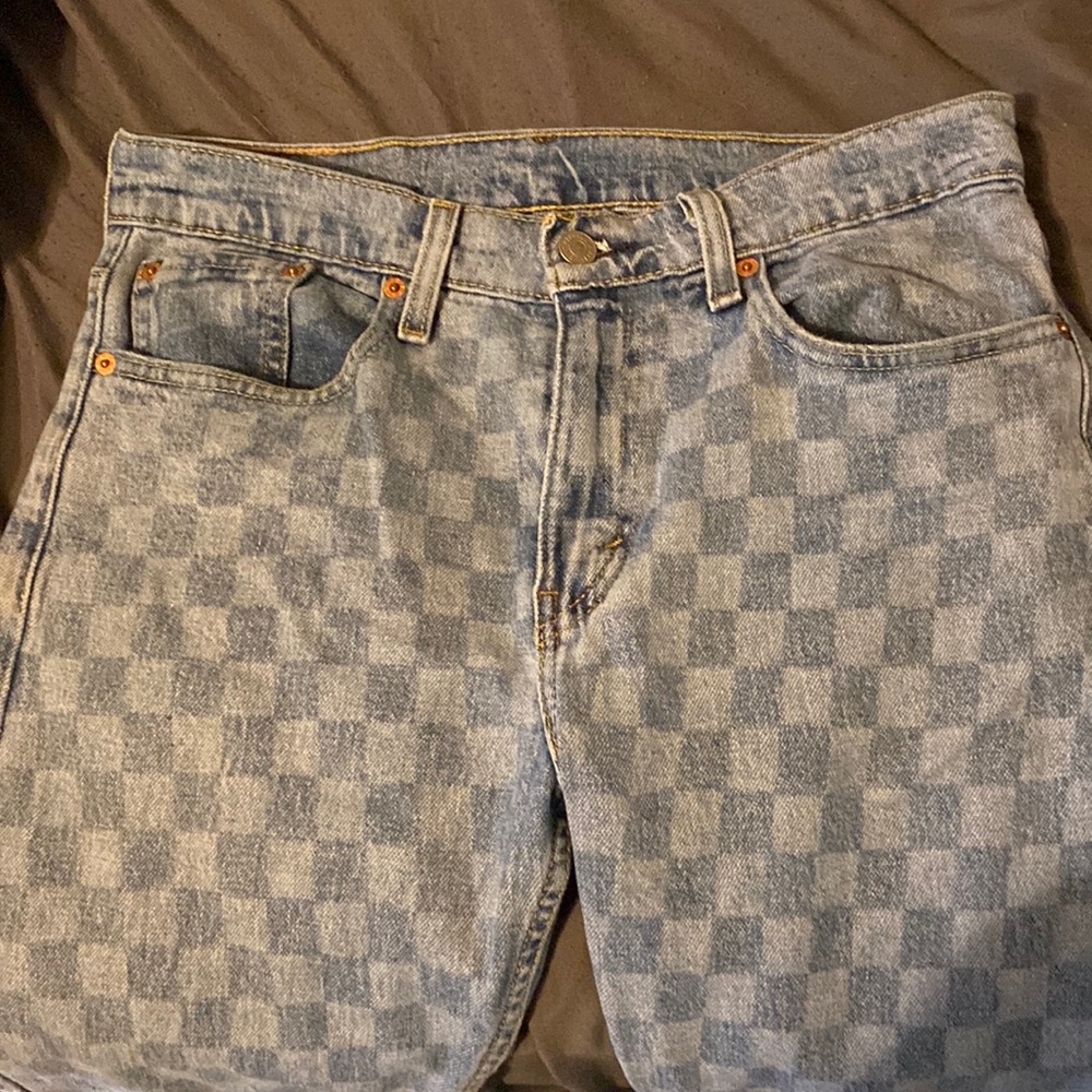 The jeans are blue checkered jeans. They are a waist 29 and they aren’t stretchy